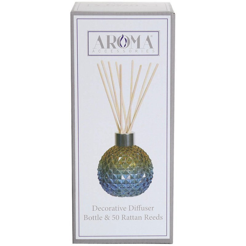 Bouteille vide ombrée bleue avec bâtons diffuseurs dans une boîte à Woodbridge Candle
